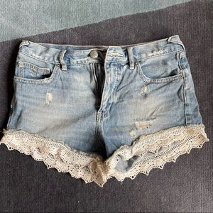 Free People crochet lace hem denim shorts